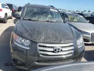 2012 Hyundai Santa Fe GLS z VIN 5XYZG3AB1CG126290, wystawiony jako Copart lot #75196484 z przebiegiem Nie podano mil oraz Szkoda całkowita • Salvage title. Historia ofert i sprzedaży dostępna na DreamBid. Obrazek 5.