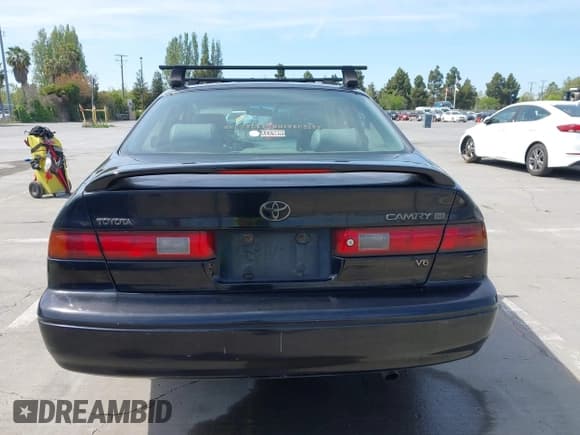 ✅ 1998 Toyota Camry LE • VIN: JT2BF28KXW0118504 • Lot: 42096672. Listed on IAAI with 257,358 mi. Free auction sales archive from the USA and detailed vehicle history report at DreamBid. Image 16.