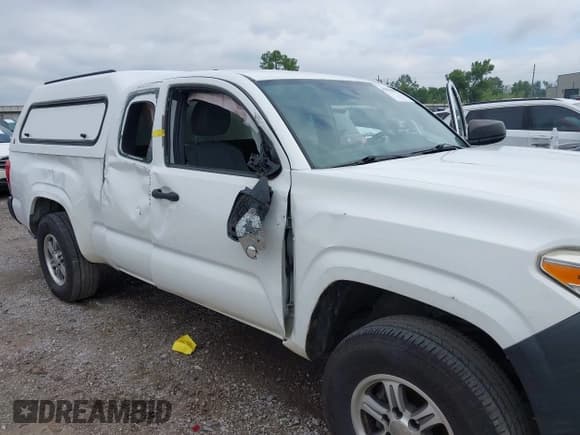 ✅ 2016 Toyota Tacoma SR • VIN: 5TFSX5EN0GX040506 • Lot: 42856059. Listed on IAAI with 223,577 mi. Free auction sales archive from the USA and detailed vehicle history report at DreamBid. Image 6.