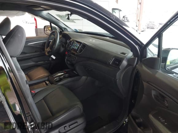 ✅ 2023 Honda Passport EX-L • VIN: 5FNYF8H52PB033173 • Lot: 42376245. Listed on IAAI with 24,134 mi. Free auction sales archive from the USA and detailed vehicle history report at DreamBid. Image 5.