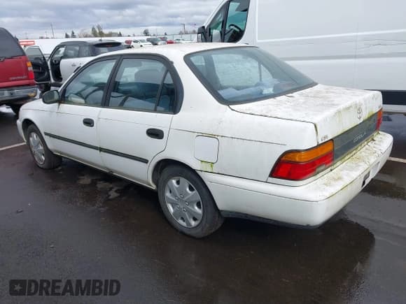 ✅ 1995 Toyota Corolla DX • VIN: 1NXAE09B9SZ288571 • Lot: 41789288. Wystawiony na IAAI z przebiegiem 181 236 mil. Bezpłatny archiwum sprzedaży aukcyjnych z USA i szczegółowy raport historii pojazdu na DreamBid. Zdjęcie 3.