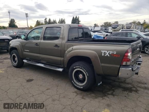 ✅ 2011 Toyota Tacoma • VIN: 3TMLU4EN1BM057479 • Lot: 85938495. Listed on Copart with 86,574 mi. Free auction sales archive from the USA and detailed vehicle history report at DreamBid. Image 2.