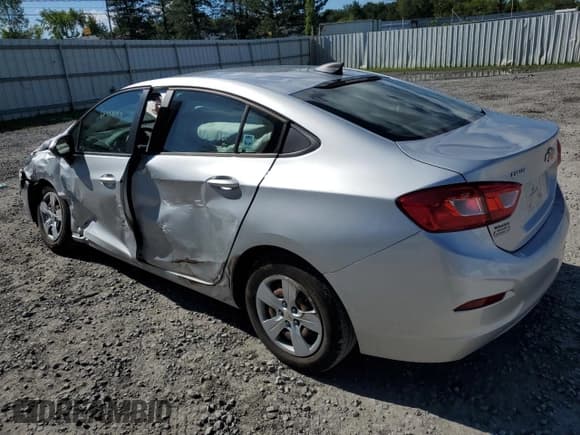 ✅ 2018 Chevrolet Cruze LS • VIN: 1G1BC5SM1J7205440 • Lot: 66359193. Listed on Copart with 15,435 mi. Free auction sales archive from the USA and detailed vehicle history report at DreamBid. Image 2.