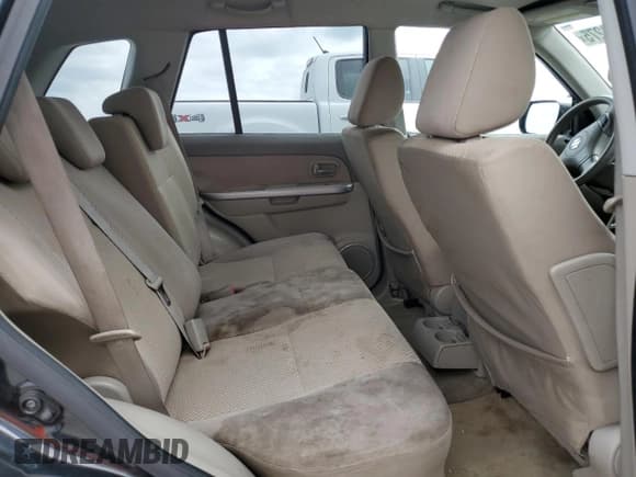 ✅ 2010 Suzuki Grand Vitara Premium • VIN: JS3TE0D26A4101341 • Лот: 69848275. Опубликован ранее на Copart с пробегом 171 410 миль. Бесплатный доступ к архиву аукционных продаж из США и подробный отчёт об истории автомобиля на DreamBid. Изображение 11.