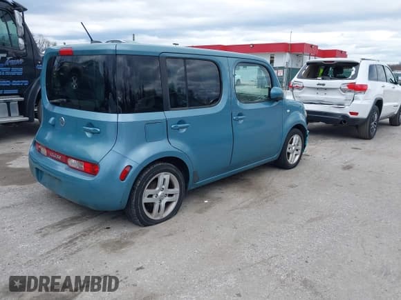 ✅ 2010 Nissan Cube S • VIN: JN8AZ2KRXAT170470 • Lot: 41751544. Listed on IAAI with 108,437 mi. Free auction sales archive from the USA and detailed vehicle history report at DreamBid. Image 4.