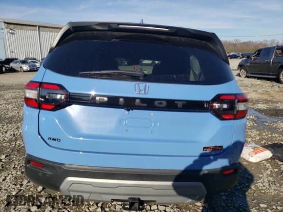 ✅ 2024 Honda Pilot TrailSport • VIN: 5FNYG1H6XRB023507 • Lot: 81461214. Listed on Copart with 12,036 mi. Free auction sales archive from the USA and detailed vehicle history report at DreamBid. Image 6.