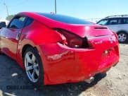 ✅ 2009 Nissan 370Z Touring • VIN: JN1AZ44E69M405179 • Lot: 41762303. Listed on IAAI with 132,853 mi. Free auction sales archive from the USA and detailed vehicle history report at DreamBid. Image 6.