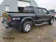 ✅ 2004 Dodge Dakota Sport • VIN: 1D7HG38K14S580302 • Лот: 79133454. Опубликован ранее на Copart с пробегом 147 806 миль. Бесплатный доступ к архиву аукционных продаж из США и подробный отчёт об истории автомобиля на DreamBid. Изображение 3.