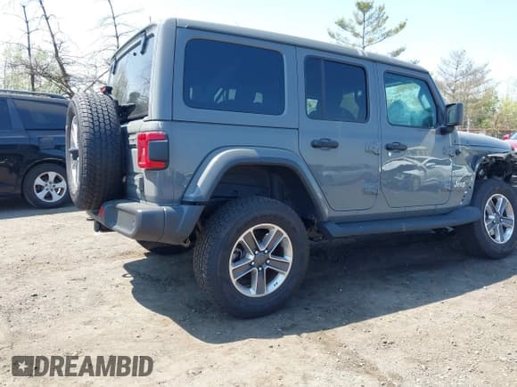 ✅ 2022 Jeep Wrangler Unlimited Sahara • VIN: 1C4HJXEM7NW206585 • Lot: 42102516. Listed on IAAI with 10,769 mi. Free auction sales archive from the USA and detailed vehicle history report at DreamBid. Image 4.
