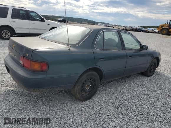 ✅ 1996 Toyota Camry DX • VIN: 4T1BG12K0TU762973 • Лот: 73868494. Опубликован ранее на Copart с пробегом 198 356 миль. Бесплатный доступ к архиву аукционных продаж из США и подробный отчёт об истории автомобиля на DreamBid. Изображение 3.