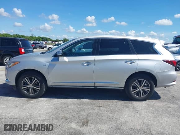✅ 2019 Infiniti QX60 Pure • VIN: 5N1DL0MM0KC557428 • Лот: 42994091. Опубликован ранее на IAAI с пробегом 99 456 миль. Бесплатный доступ к архиву аукционных продаж из США и подробный отчёт об истории автомобиля на DreamBid. Изображение 14.