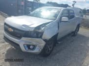 ✅ 2019 Chevrolet Colorado 4WD Z71 • VIN: 1GCGTDEN9K1127490 • Лот: 43338644. Опубликован ранее на IAAI с пробегом 85 920 миль. Бесплатный доступ к архиву аукционных продаж из США и подробный отчёт об истории автомобиля на DreamBid. Изображение 2.