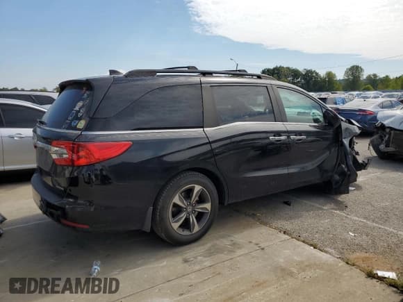 ✅ 2018 Honda Odyssey Touring • VIN: 5FNRL6H89JB043637 • Lot: 71041115. Wystawiony na Copart z przebiegiem 177 861 mil. Bezpłatny archiwum sprzedaży aukcyjnych z USA i szczegółowy raport historii pojazdu na DreamBid. Zdjęcie 3.