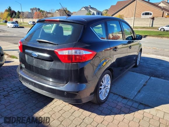 ✅ 2015 Ford C-Max SEL • VIN: 1FADP5CU1FL110545 • Lot: 90503505. Wystawiony na Copart z przebiegiem 131 445 mil. Bezpłatny archiwum sprzedaży aukcyjnych z USA i szczegółowy raport historii pojazdu na DreamBid. Zdjęcie 4.