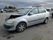 ✅ 2009 Kia Rio LX • VIN: KNADE223196578055 • Lot: 91144795. Listed on Copart with 184,440 mi. Free auction sales archive from the USA and detailed vehicle history report at DreamBid. Image 1.