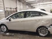✅ 2017 Ford Fiesta Titanium • VIN: 3FADP4CJ2HM123869 • Lot: 41571724. Wystawiony na IAAI z przebiegiem 103 452 mil. Bezpłatny archiwum sprzedaży aukcyjnych z USA i szczegółowy raport historii pojazdu na DreamBid. Zdjęcie 15.