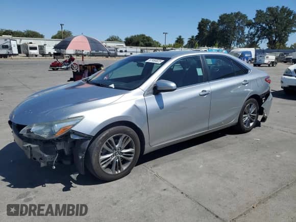 2015 Toyota Camry LE with VIN 4T1BF1FK5FU034874, listed as a Copart auction lot 67466825 with 166,917 mi miles and Salvage title. Bid and sale history available at DreamBid. Image 1.