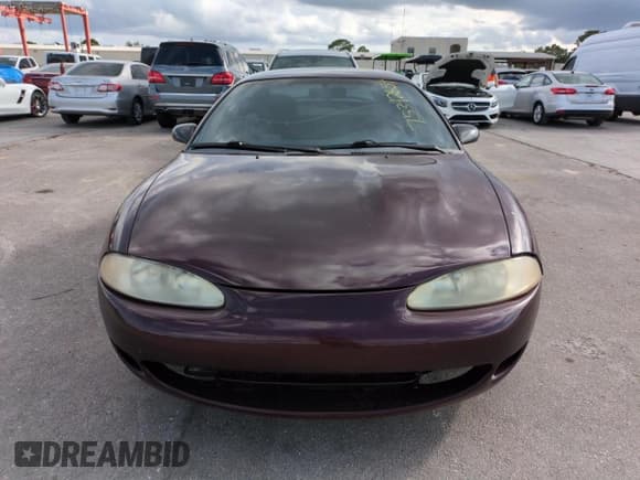 ✅ 1996 Mitsubishi Eclipse RS • VIN: 4A3AK34Y7TE422996 • Лот: 75342854. Опубликован ранее на Copart с пробегом Не указан. Бесплатный доступ к архиву аукционных продаж из США и подробный отчёт об истории автомобиля на DreamBid. Изображение 5.