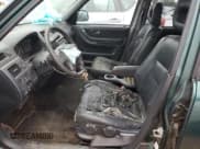 ✅ 2000 Honda CR-V SE • VIN: JHLRD1878YC030945 • Lot: 67090575. Wystawiony na Copart z przebiegiem 291 706 mil. Bezpłatny archiwum sprzedaży aukcyjnych z USA i szczegółowy raport historii pojazdu na DreamBid. Zdjęcie 7.