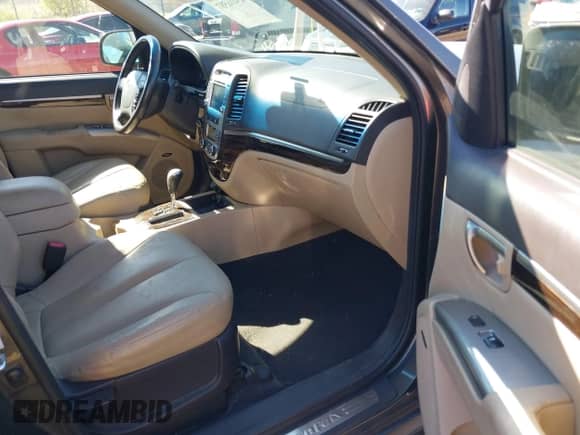 2012 Hyundai Santa Fe Limited with VIN 5XYZKDAG9CG120382, listed as a IAAI auction lot 43416587 with 205,312 mi miles and . Bid and sale history available at DreamBid. Image 5.