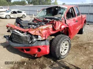 2003 Dodge Dakota Sport с VIN 1D7HL38X63S122194, выставлен на аукционе Copart как лот 58235722 с пробегом Не указан миль и На запчасти • Non repairable. История ставок и продаж доступна на DreamBid. Изображение 2.