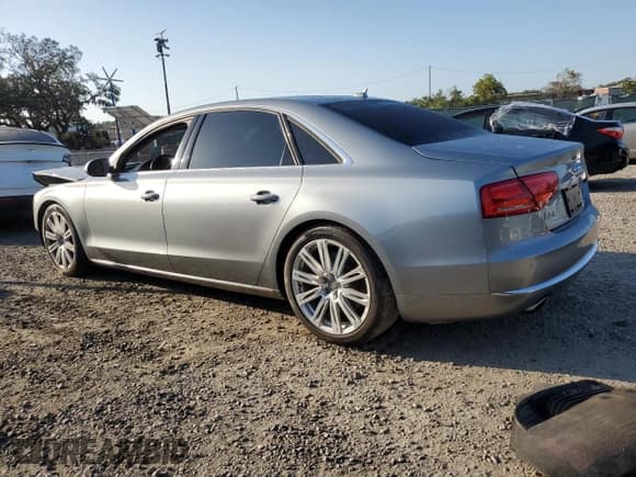 ✅ 2012 Audi A8 • VIN: WAURVAFD2CN016861 • Lot: 52667165. Listed on Copart with 101,793 mi. Free auction sales archive from the USA and detailed vehicle history report at DreamBid. Image 2.