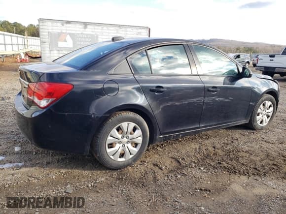 ✅ 2016 Chevrolet Cruze LS • VIN: 1G1PB5SH4G7160045 • Lot: 87715735. Listed on Copart with 142,530 mi. Free auction sales archive from the USA and detailed vehicle history report at DreamBid. Image 3.