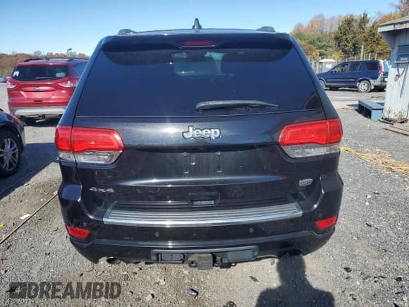 ✅ 2014 Jeep Grand Cherokee Overland • VIN: 1C4RJFCG3EC272614 • Lot: 89529875. Listed on Copart with 121,117 mi. Free auction sales archive from the USA and detailed vehicle history report at DreamBid. Image 6.