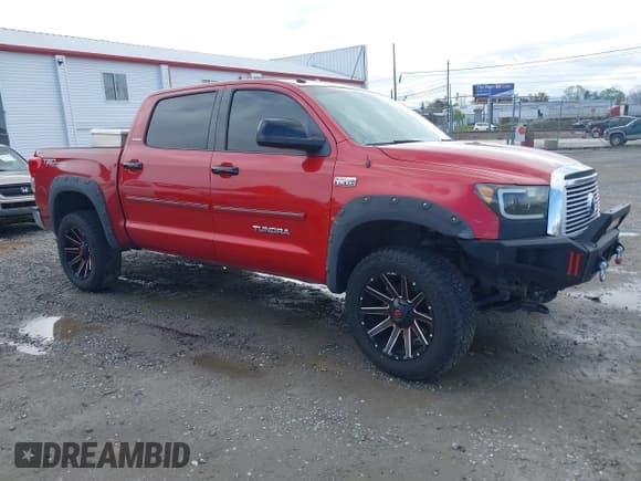 ✅ 2012 Toyota Tundra Limited • VIN: 5TFHY5F13CX250112 • Lot: 42025726. Listed on IAAI with 130,227 mi. Free auction sales archive from the USA and detailed vehicle history report at DreamBid. Image 1.