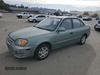 2004 Hyundai Accent GL z VIN KMHCG45C14U540938, wystawiony jako Copart lot #46701935 z przebiegiem 71 891 mil mil oraz Szkoda całkowita • Salvage title. Historia ofert i sprzedaży dostępna na DreamBid. Obrazek 1.