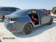 ✅ 2023 Mazda 3 S Carbon Edition • VIN: 3MZBPBCM4PM360097 • Лот: 72000575. Опубликован ранее на Copart с пробегом 54 511 миль. Бесплатный доступ к архиву аукционных продаж из США и подробный отчёт об истории автомобиля на DreamBid. Изображение 3.