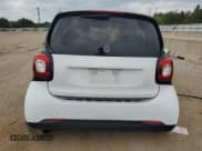 ✅ 2016 Smart fortwo Prime • VIN: WMEFJ5DA4GK054621 • Lot: 68703105. Wystawiony na Copart z przebiegiem 70 845 mil. Bezpłatny archiwum sprzedaży aukcyjnych z USA i szczegółowy raport historii pojazdu na DreamBid. Zdjęcie 6.