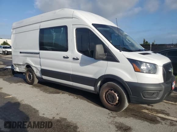 ✅ 2023 Ford Transit Cargo • VIN: 1FTBR3X80PKA82581 • Lot: 85100375. Wystawiony na Copart z przebiegiem 222 498 mil. Bezpłatny archiwum sprzedaży aukcyjnych z USA i szczegółowy raport historii pojazdu na DreamBid. Zdjęcie 4.
