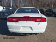 ✅ 2014 Dodge Charger Police • VIN: 2C3CDXAT2EH350711 • Lot: 43688159. Listed on IAAI with 128,318 mi. Free auction sales archive from the USA and detailed vehicle history report at DreamBid. Image 16.