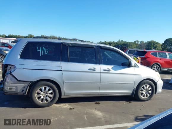 ✅ 2010 Honda Odyssey EX-L • VIN: 5FNRL3H72AB088330 • Lot: 43353573. Listed on IAAI with 229,734 mi. Free auction sales archive from the USA and detailed vehicle history report at DreamBid. Image 14.