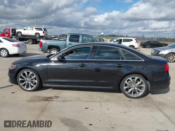 ✅ 2014 Audi A6 Prestige • VIN: WAUHGAFC4EN126584 • Лот: 43728941. Опубликован ранее на IAAI с пробегом 180 492 миль. Бесплатный доступ к архиву аукционных продаж из США и подробный отчёт об истории автомобиля на DreamBid. Изображение 14.