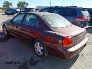 ✅ 1999 Hyundai Sonata GLS • VIN: KMHWF35V9XA042620 • Lot: 42922692. Listed on IAAI with 106,603 mi. Free auction sales archive from the USA and detailed vehicle history report at DreamBid. Image 3.
