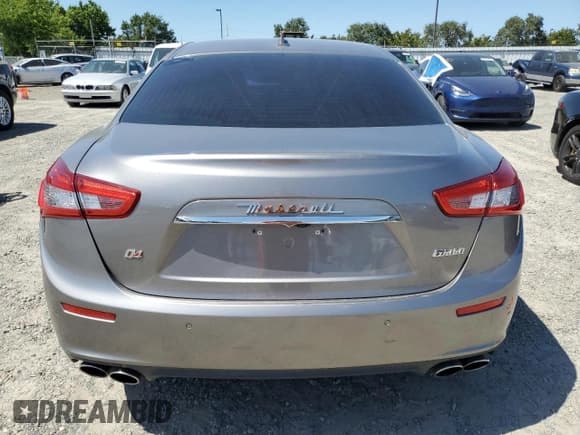 ✅ 2015 Maserati Ghibli S Q4 • VIN: ZAM57RTA1F1144116 • Lot: 60228315. Listed on Copart with 46,037 mi. Free auction sales archive from the USA and detailed vehicle history report at DreamBid. Image 6.