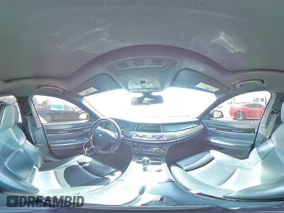 ✅ 2013 BMW 7 Series 750i • VIN: WBAYA8C54DC996412 • Lot: 56982895. Listed on Copart with 124,258 mi. Free auction sales archive from the USA and detailed vehicle history report at DreamBid. Image 14.