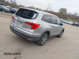 ✅ 2017 Honda Pilot EX-L • VIN: 5FNYF6H55HB051110 • Lot: 43788936. Listed on IAAI with 129,927 mi. Free auction sales archive from the USA and detailed vehicle history report at DreamBid. Image 4.