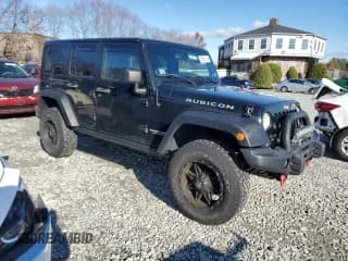 ✅ 2014 Jeep Wrangler Unlimited Rubicon • VIN: 1C4HJWFGXEL209825 • Лот: 93051245. Опубликован ранее на Copart с пробегом 159 888 миль. Бесплатный доступ к архиву аукционных продаж из США и подробный отчёт об истории автомобиля на DreamBid. Изображение 4.