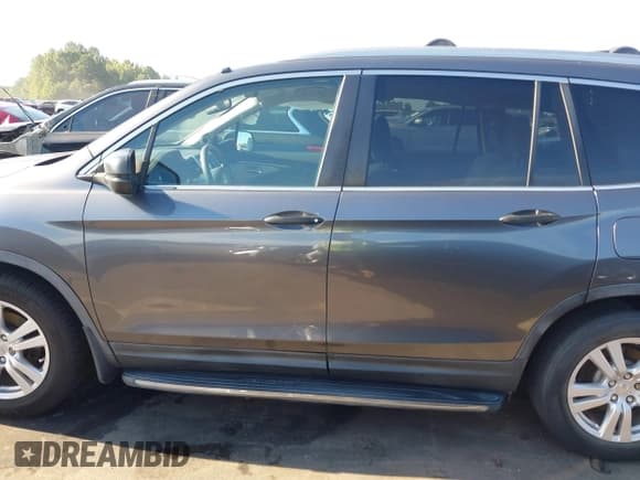 ✅ 2016 Honda Pilot LX • VIN: 5FNYF5H10GB026766 • Lot: 43123186. Listed on IAAI with 246,308 mi. Free auction sales archive from the USA and detailed vehicle history report at DreamBid. Image 14.