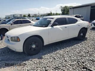 ✅ 2010 Dodge Charger Police • VIN: 2B3AA4CT7AH175939 • Lot: 63022965. Wystawiony na Copart z przebiegiem 137 096 mil. Bezpłatny archiwum sprzedaży aukcyjnych z USA i szczegółowy raport historii pojazdu na DreamBid. Zdjęcie 1.