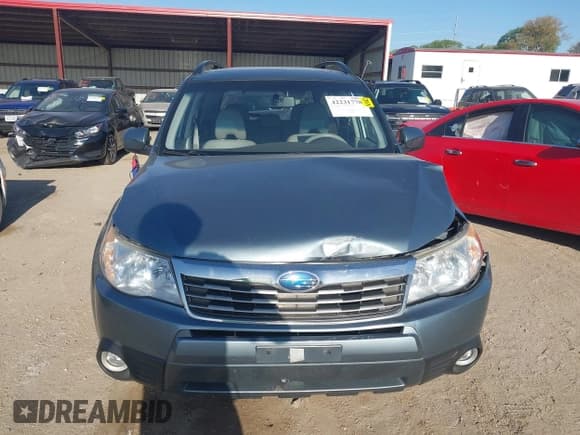 ✅ 2009 Subaru Forester X Limited • VIN: JF2SH64629H744847 • Lot: 42231778. Listed on IAAI with 172,139 mi. Free auction sales archive from the USA and detailed vehicle history report at DreamBid. Image 12.