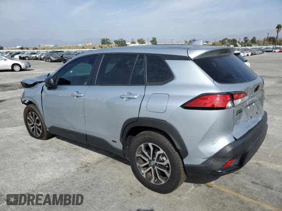 ✅ 2023 Toyota Corolla Cross Hybrid S • VIN: 7MUFBABG5PV017023 • Lot: 90942025. Listed on Copart with 18,740 mi. Free auction sales archive from the USA and detailed vehicle history report at DreamBid. Image 2.