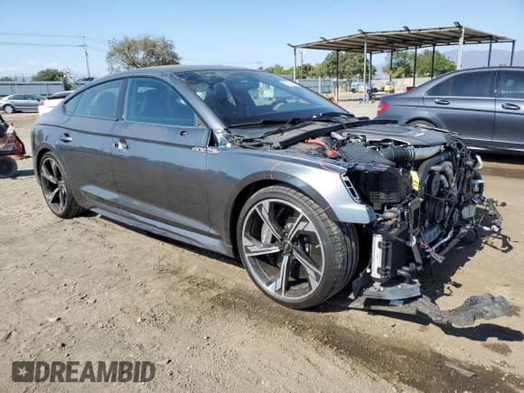 ✅ 2022 Audi RS 5 Sportback • VIN: WUAAWCF52NA901057 • Lot: 62050164. Listed on Copart with 22,175 mi. Free auction sales archive from the USA and detailed vehicle history report at DreamBid. Image 4.