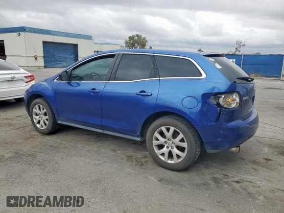 ✅ 2007 Mazda CX-7 Grand Touring • VIN: JM3ER293570119328 • Лот: 71736745. Опубликован ранее на Copart с пробегом 139 131 миль. Бесплатный доступ к архиву аукционных продаж из США и подробный отчёт об истории автомобиля на DreamBid. Изображение 2.