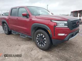 ✅ 2023 Nissan Frontier Pro-X • VIN: 1N6ED1EJ6PN610044 • Lot: 41570970. Listed on IAAI with 22,962 mi. Free auction sales archive from the USA and detailed vehicle history report at DreamBid. Image 1.