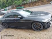 ✅ 2018 BMW 5 Series M550i xDrive • VIN: WBAJB9C5XJB286923 • Лот: 42527301. Опубликован ранее на IAAI с пробегом 76 923 миль. Бесплатный доступ к архиву аукционных продаж из США и подробный отчёт об истории автомобиля на DreamBid. Изображение 13.