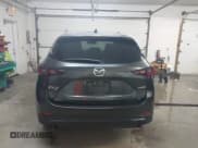✅ 2022 Mazda CX-5 S Carbon Edition • VIN: JM3KFBCM1N0577670 • Лот: 43821338. Опубликован ранее на IAAI с пробегом 59 967 миль. Бесплатный доступ к архиву аукционных продаж из США и подробный отчёт об истории автомобиля на DreamBid. Изображение 16.